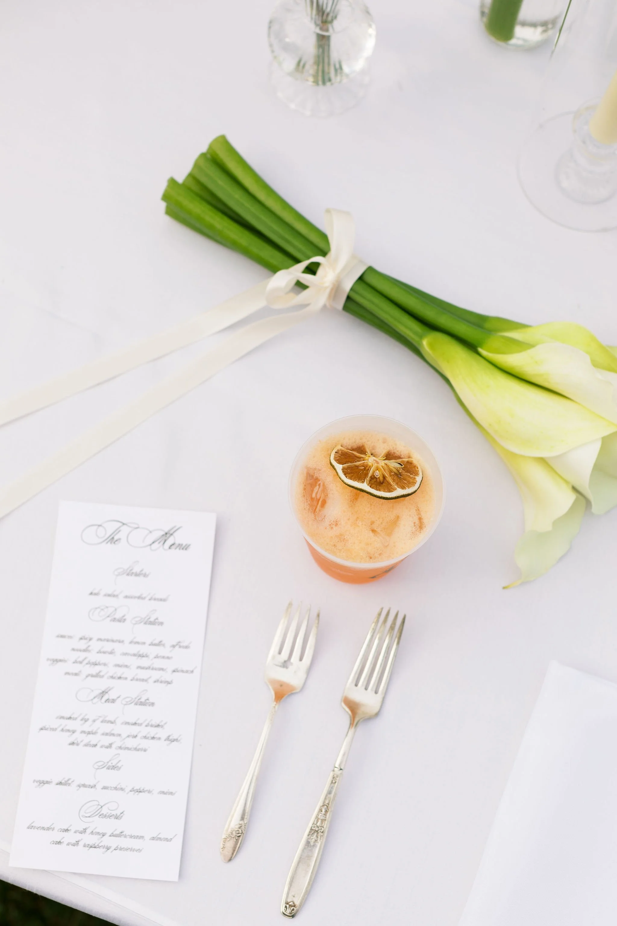 signature drink and menu flat lay wedding.jpg