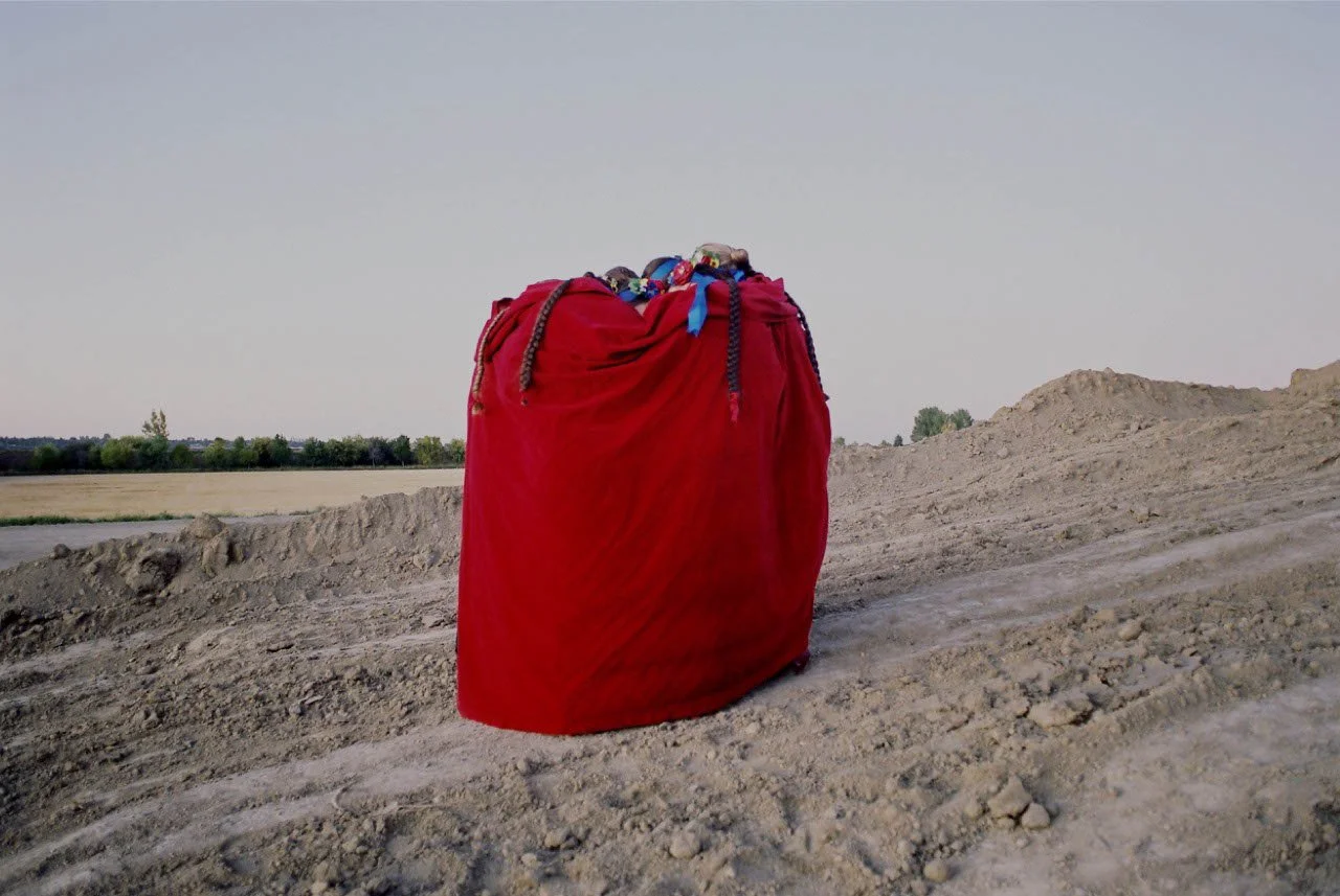 Amalie Atkins, Huddle with red cloak from Diamond Eye Assembly: A Cinematic Film Installation, 2019, photograph. Copyright of the artist.