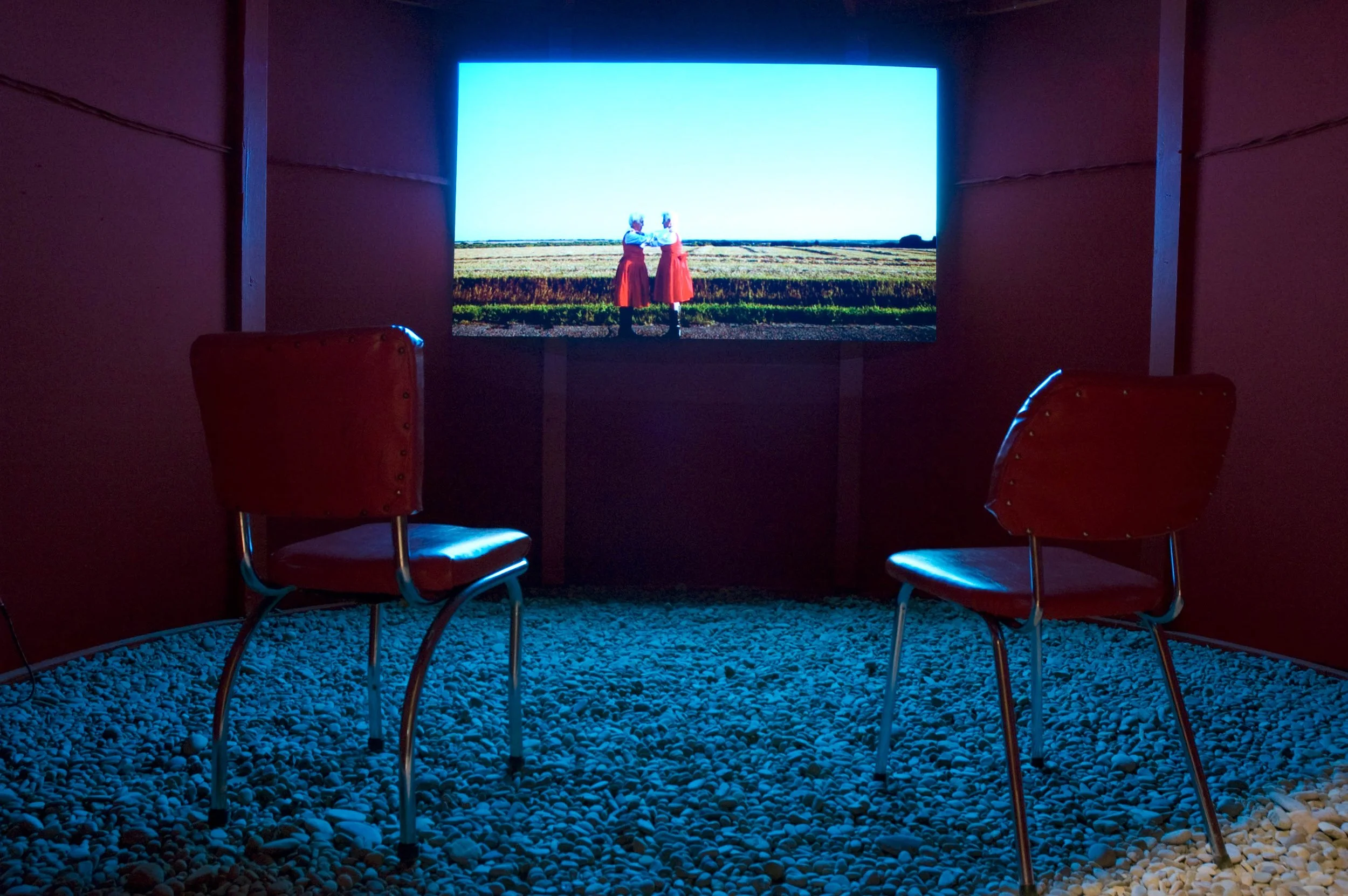 Amalie Atkins, "Embrace" 2013, photographs, video installation and performance. Installation view at the College Art Galleries, Saskatoon, 2015. Copyright of the artist.