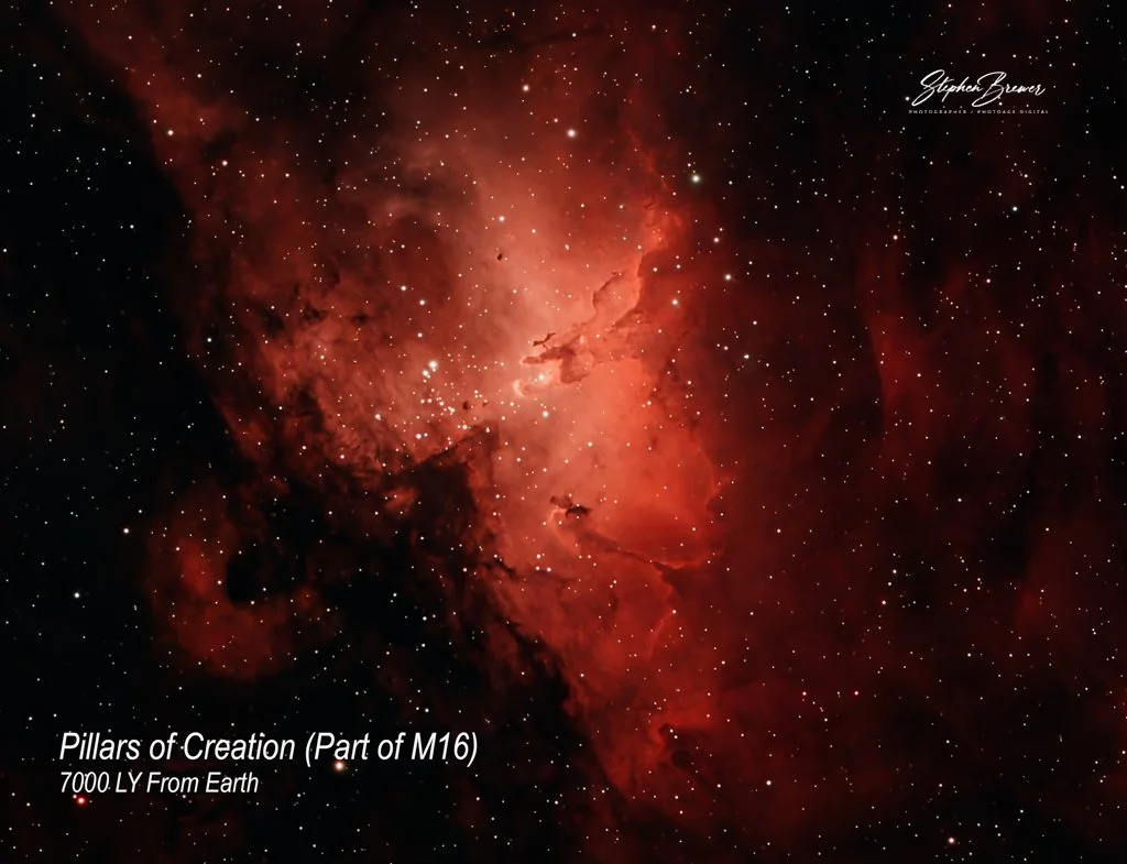 Image of the Pillars of Creation, a famous part of the M16 nebula, showing a red and orange cloud of gas and dust with numerous stars, taken from Earth 7000 light-years away.