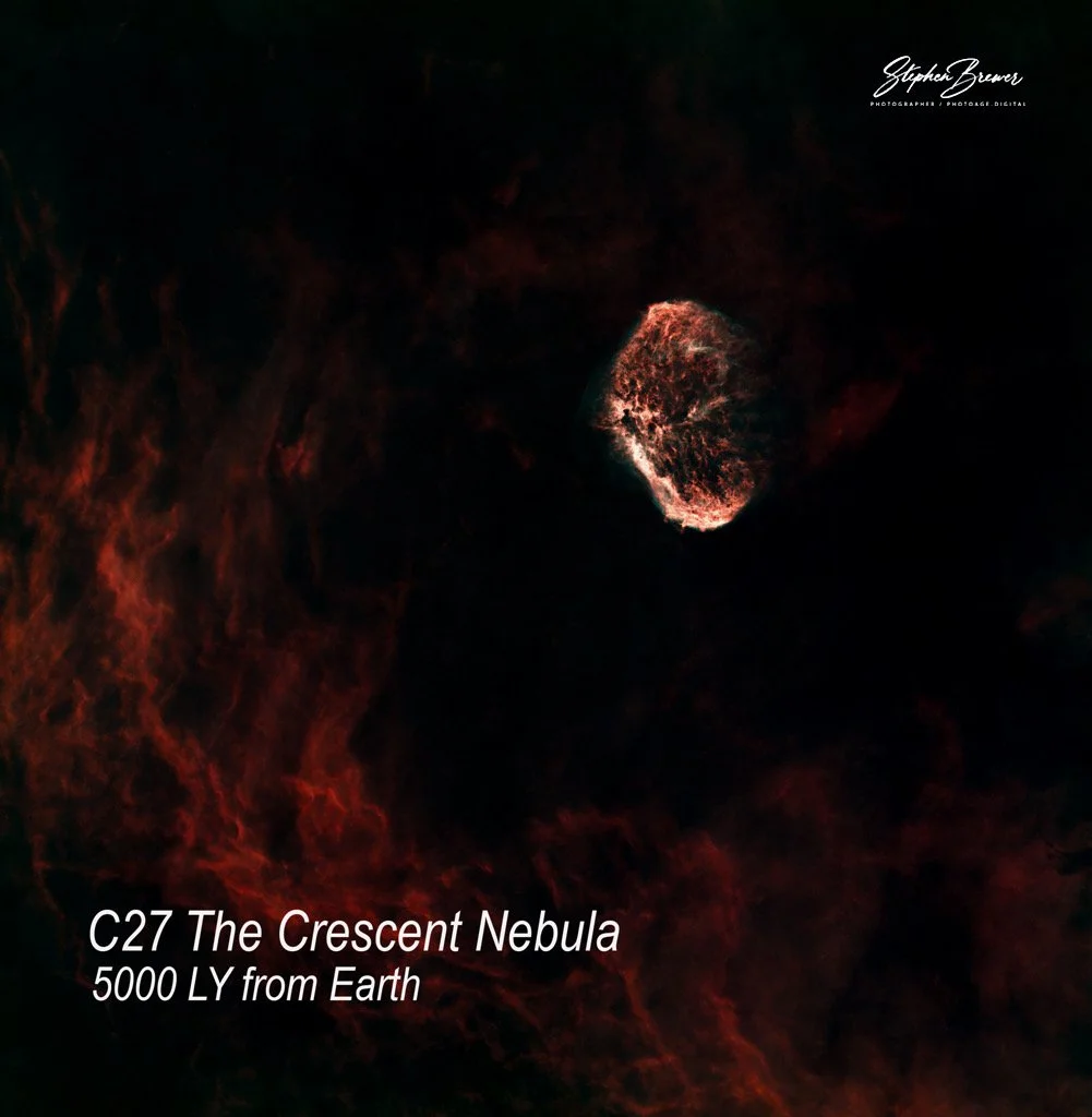 The image shows a dark space scene featuring a bright, textured nebula called C27 The Crescent Nebula, located 5000 light years from Earth.