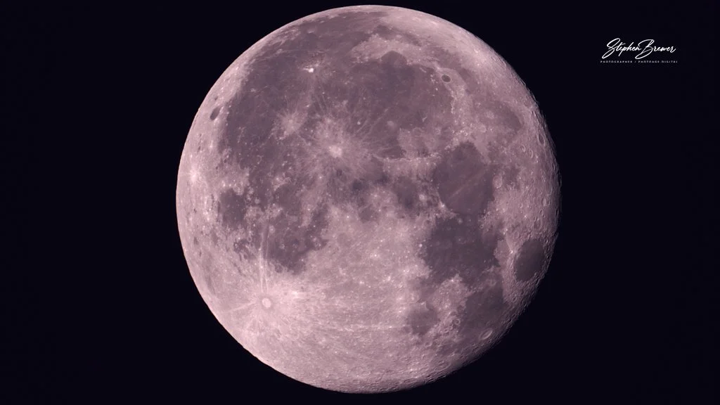 Close-up of the full moon against a dark night sky.