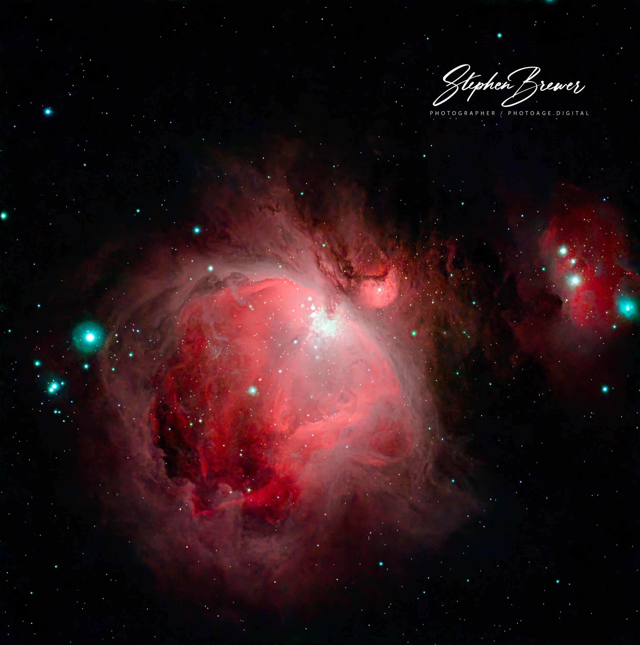 A deep space image of a nebula with red, pink, and dark areas, dotted with numerous bright stars against a black background.