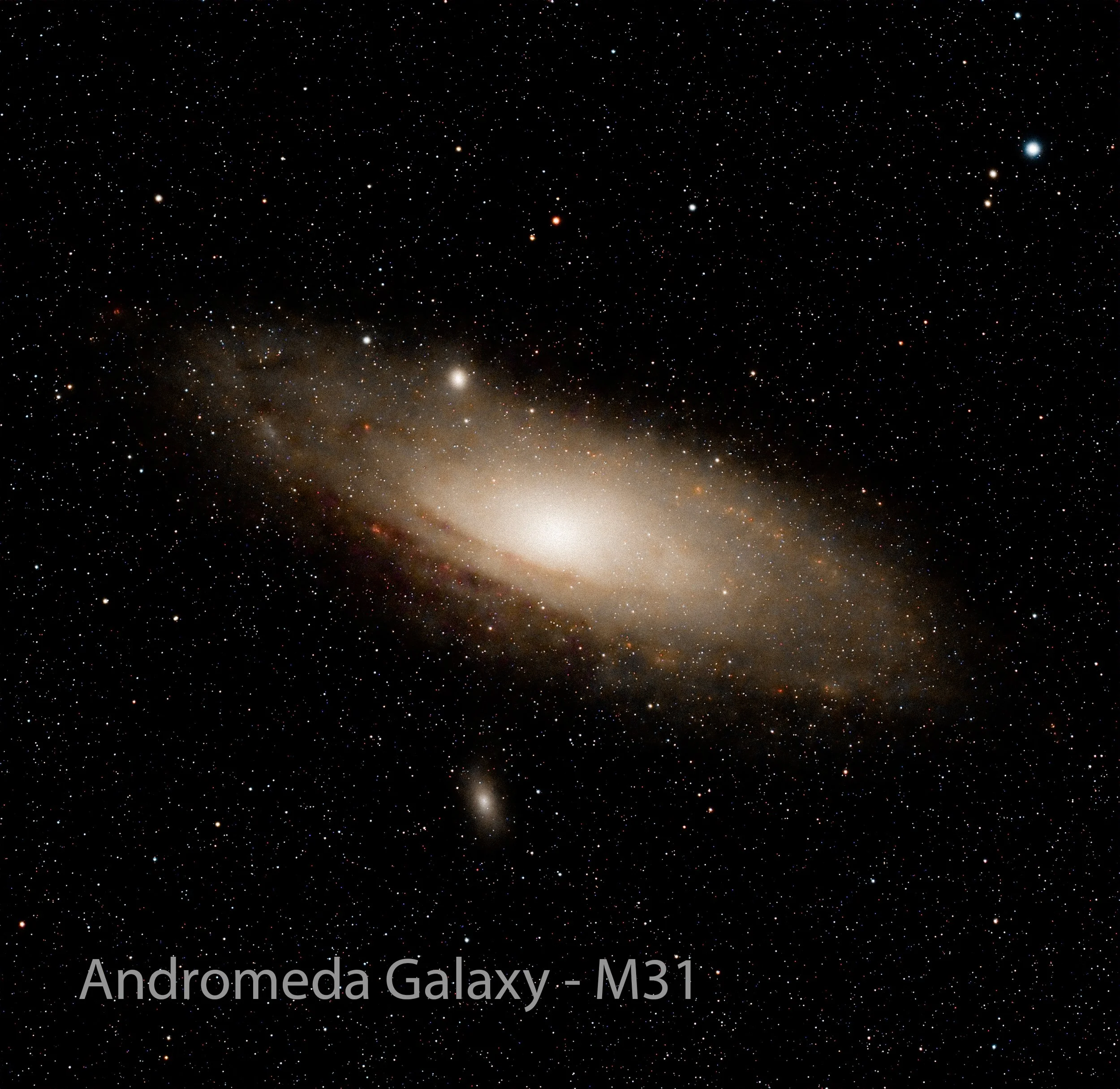 A view of the galaxy Andromeda with a dense cluster of stars and a bright central core, against a backdrop of countless stars in space.