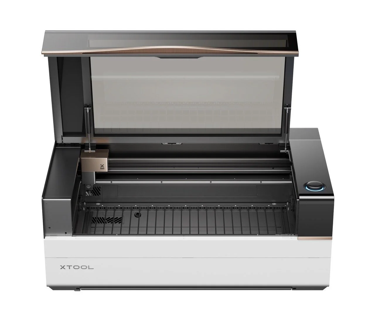 Empty laser cutting machine with open lid, XTool branding, and a control dial on the right side.