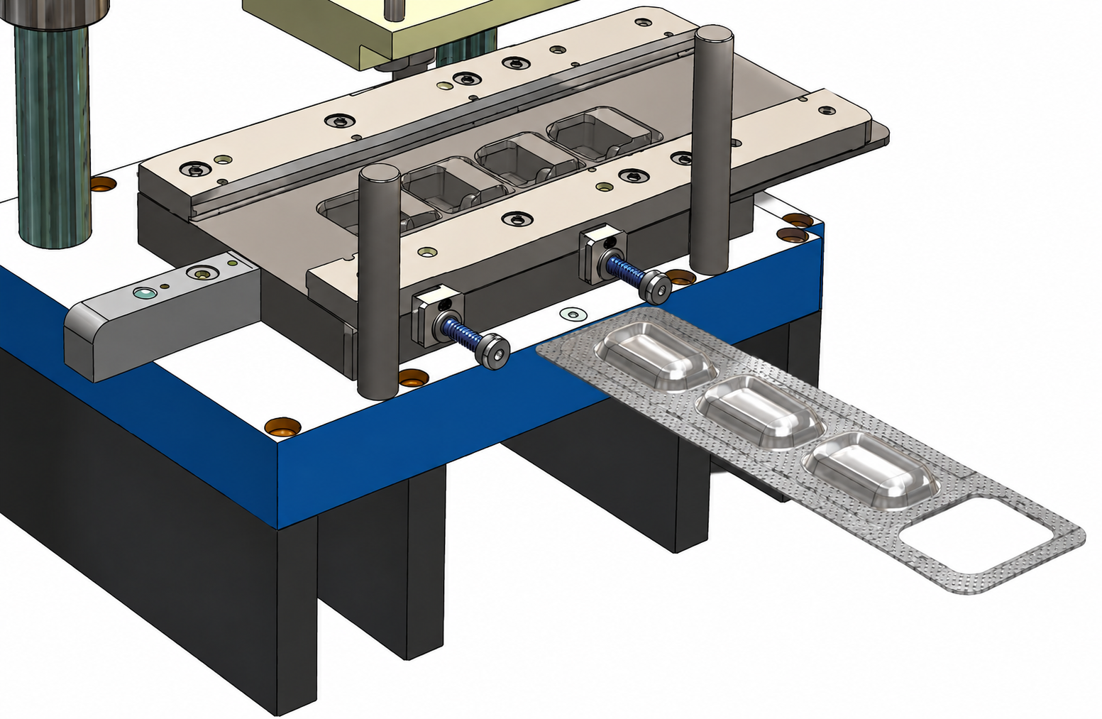 A manufacturing mold station for die cutting a blister pack with three cavities is placed at the end of the mold for packaging.