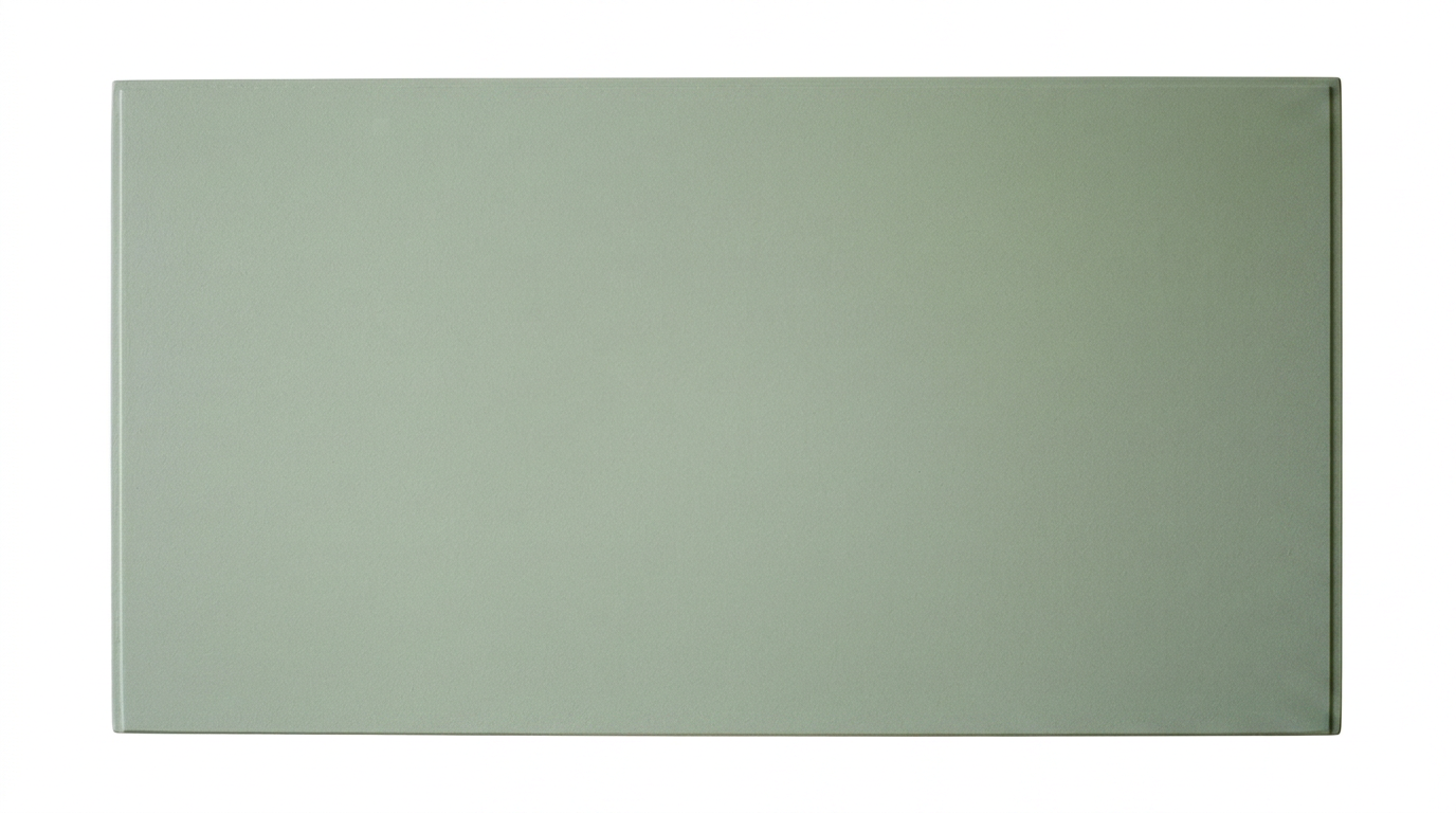 A rectangular, light green object with a flat surface and slightly rounded edges, possibly a panel or door.