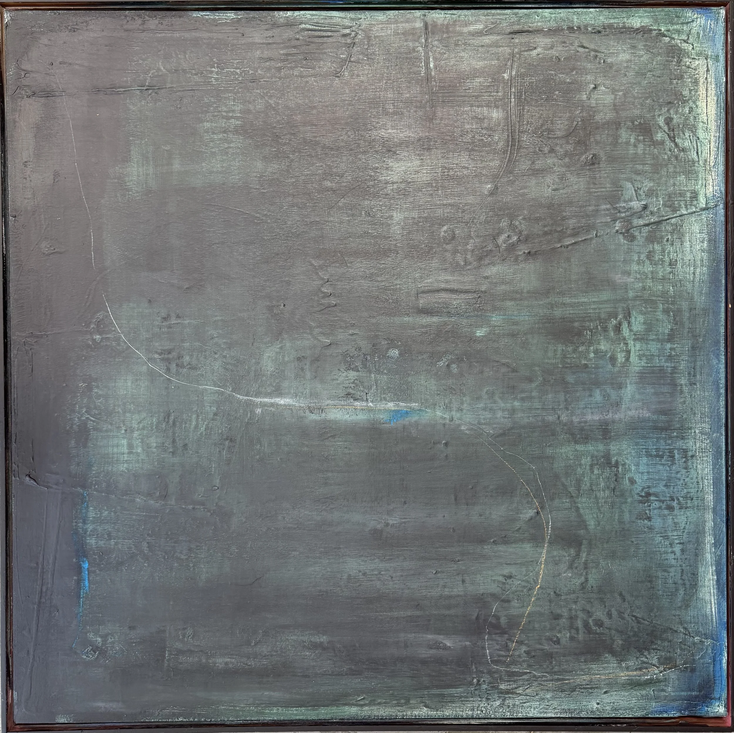An abstract painting on a canvas with layered gray, blue, green, and yellow streaks and textures.