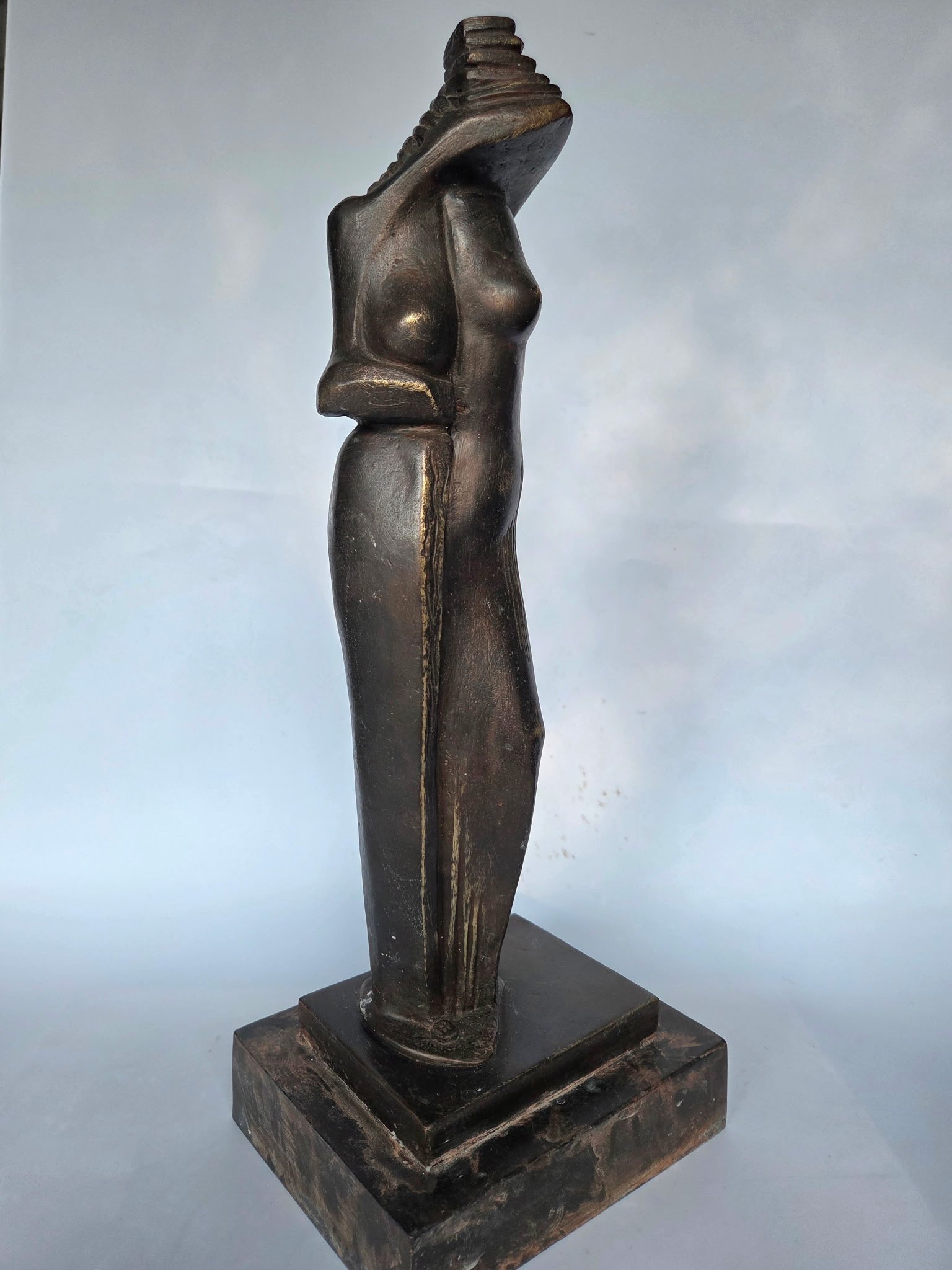 "SHY" -A reflection on the vulnerability of adolescence, this sculpture captures a young woman coming into her own while struggling with shyness and self-confidence. As she matures, she instinctively covers her body, hiding the natural beauty she has