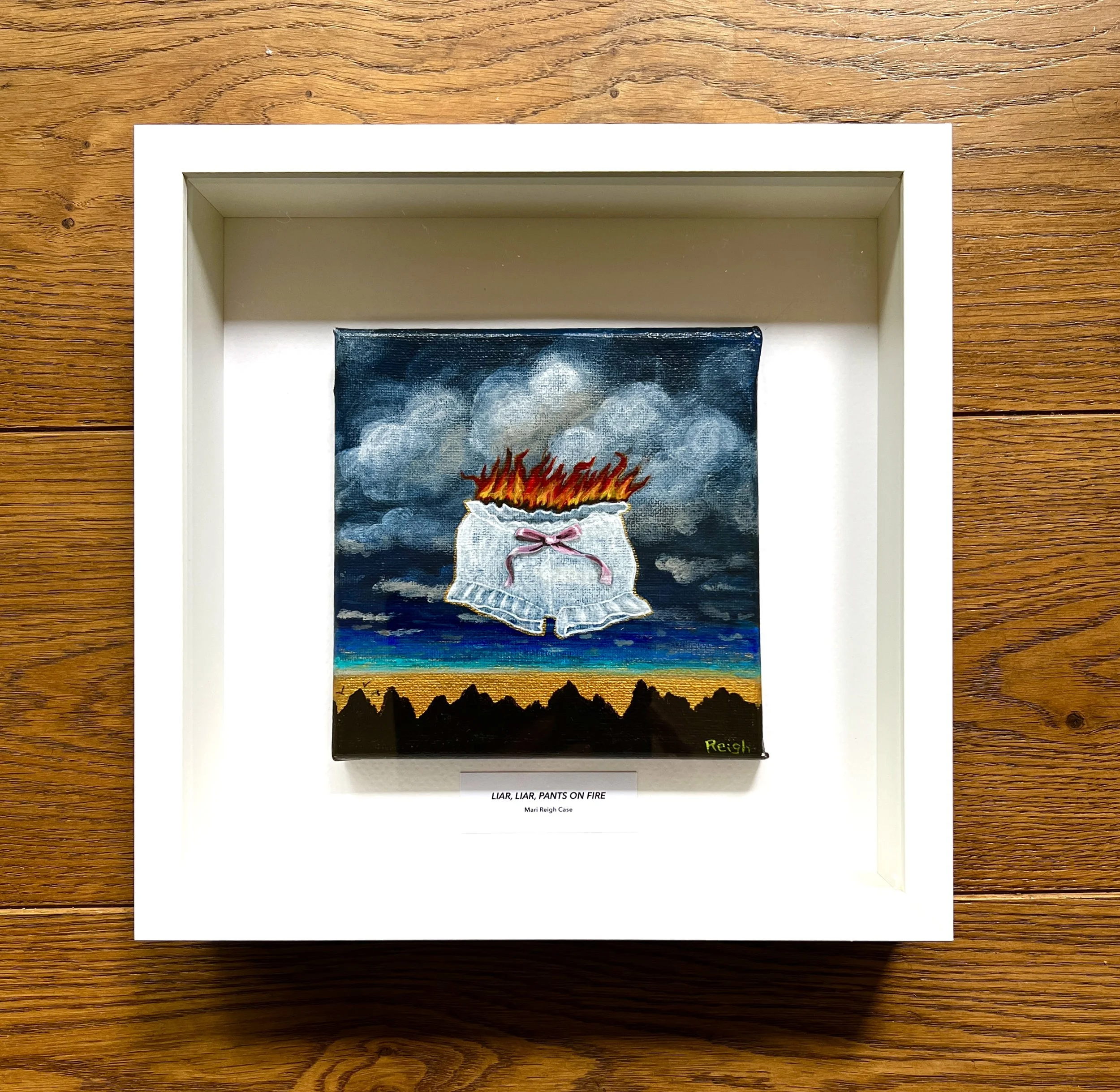 LIAR LIAR PANTS ON FIRE (Original painting on canvas in 25x25cm white shadow box)