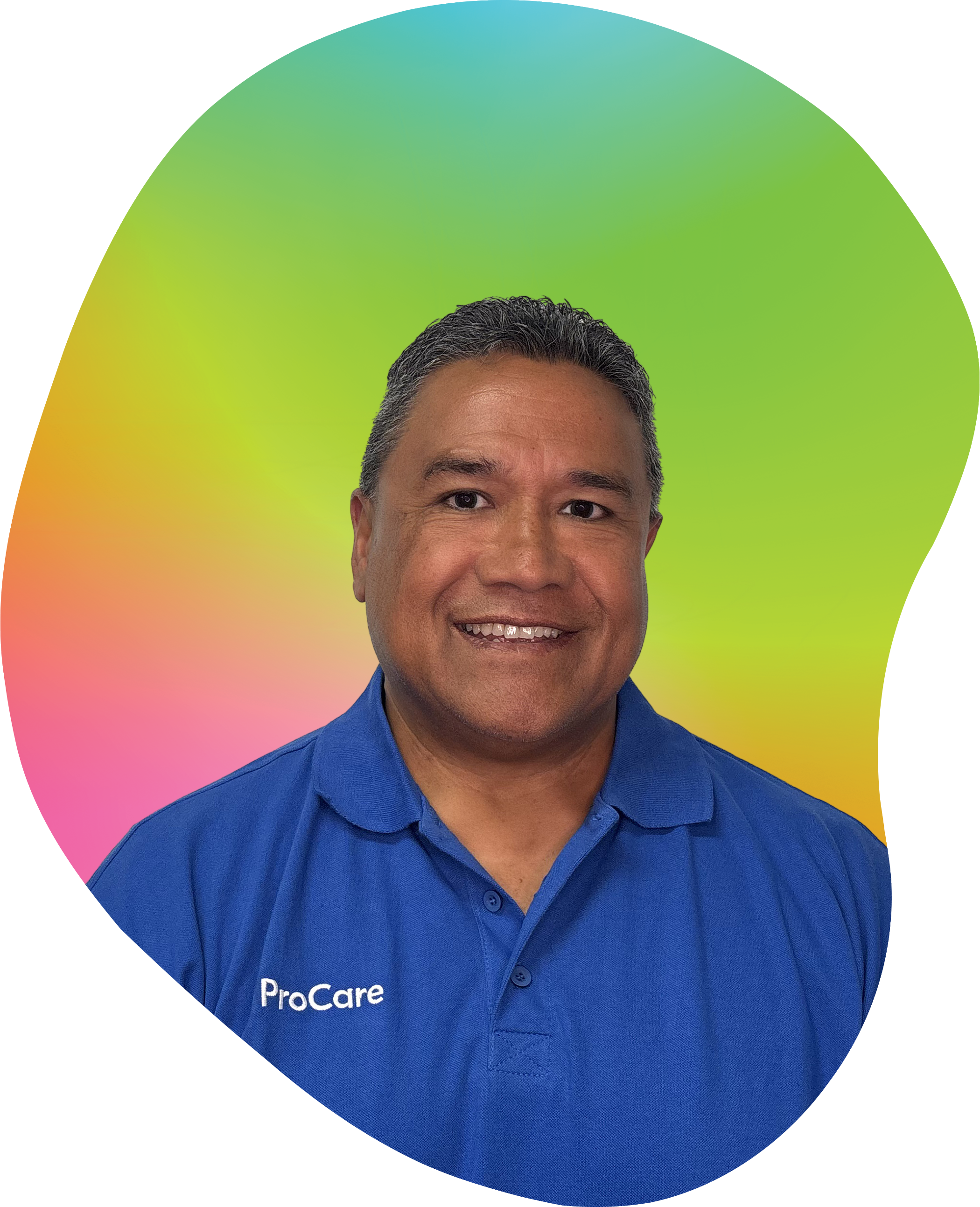 A smiling man wearing a blue polo shirt with 'ProCare' embroidered on it, standing against a colorful gradient background.