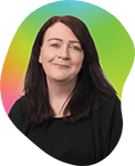 A woman with long dark hair smiling against a colorful gradient background.