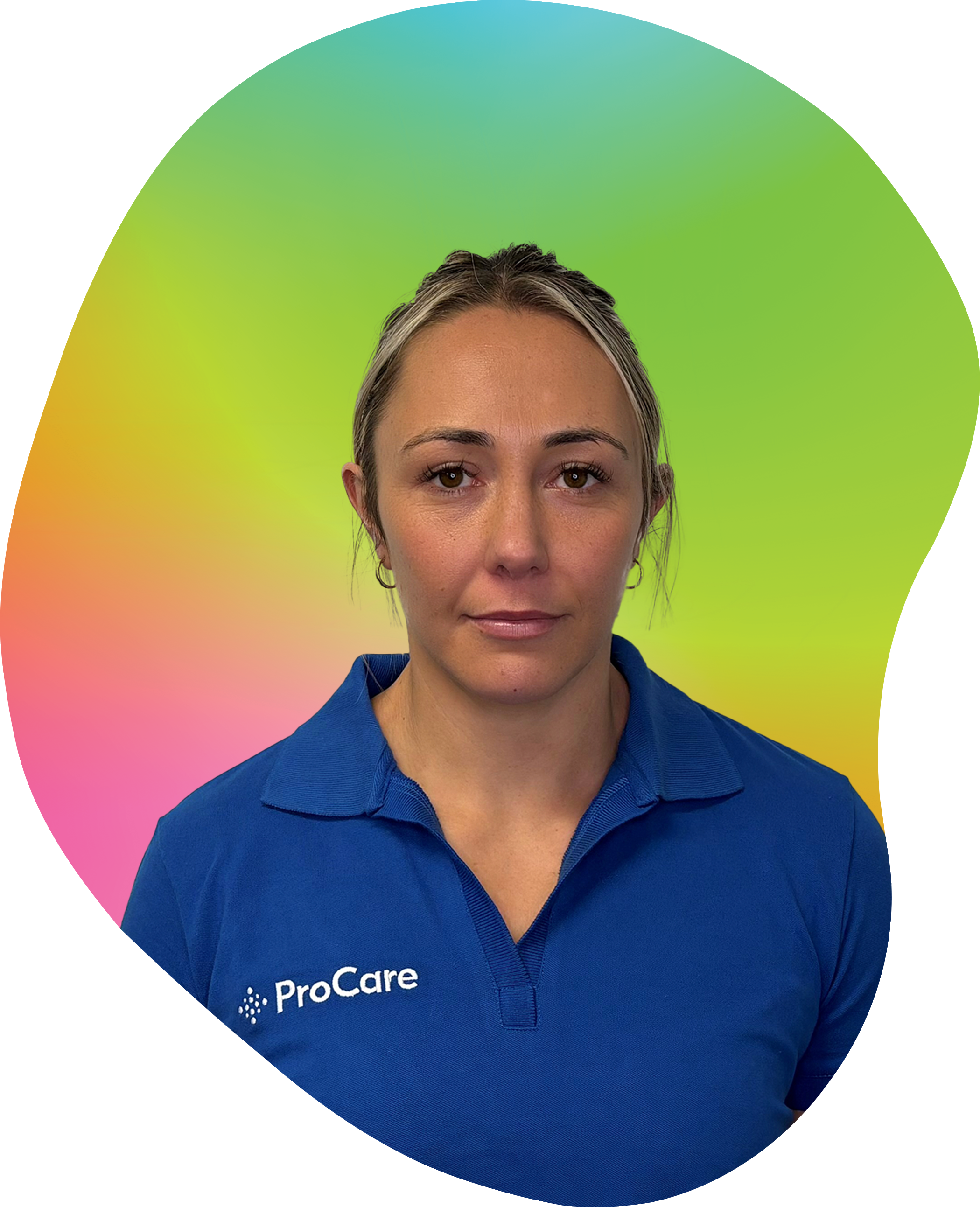 A woman with brown hair and brown eyes wearing a blue ProCare shirt, standing in front of a colorful gradient background.