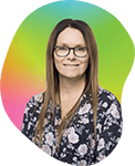 Women with glasses and long hair in front of a colorful, gradient background.