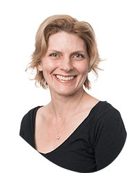 A woman with short curly hair and a big smile, wearing a black top, against a white background.