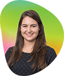 Portrait of a woman with long brown hair smiling, against a gradient background of green, yellow, and pink