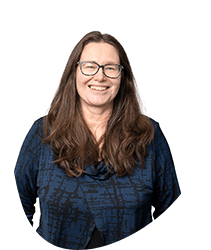 A smiling woman with long brown hair, glasses, and a blue patterned top, standing against a white background with a black circular border.
