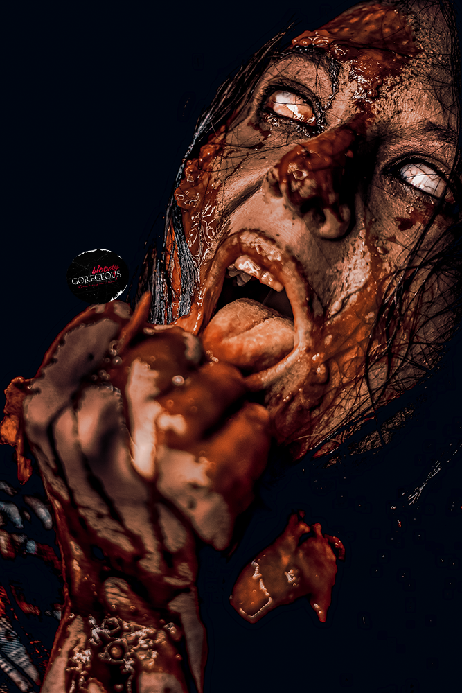 A person with disgusting, broken skin and smeared makeup is licking a large piece of chocolate cake, with eyes rolled back and mouth open.