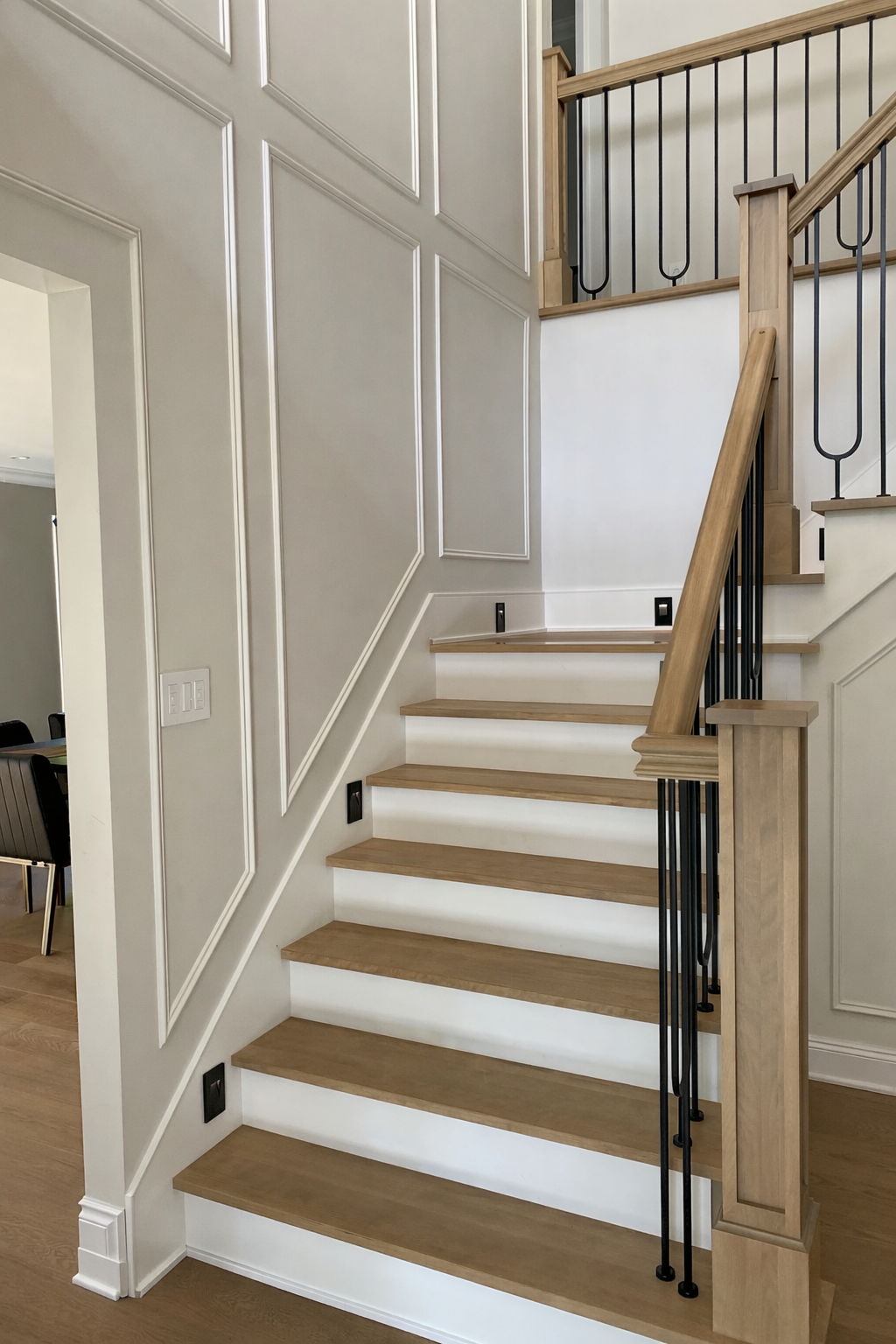 Bright staircase and elegant molding.png