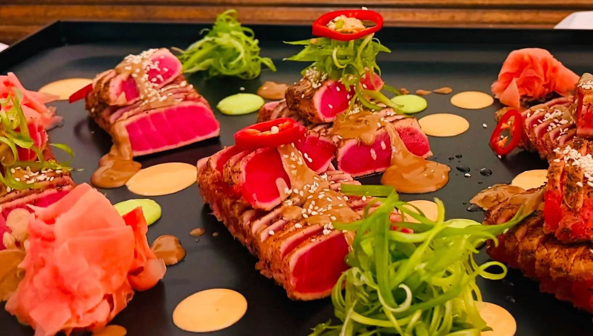 Togarashi Spiced Ahi- Whisky Barrel Shoyu Butter- Sriracha Aioli- Wasabi- Pickled Ginger
