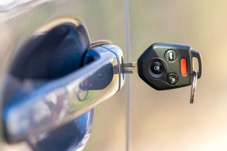 Car key inserted in a car door lock