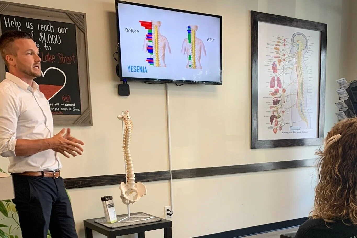 Photo of chiropractor speaking to group.