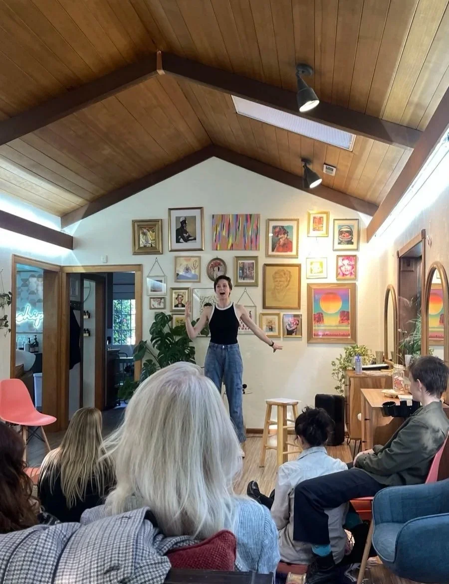Elyssa performing at the Azalea Jane Salon