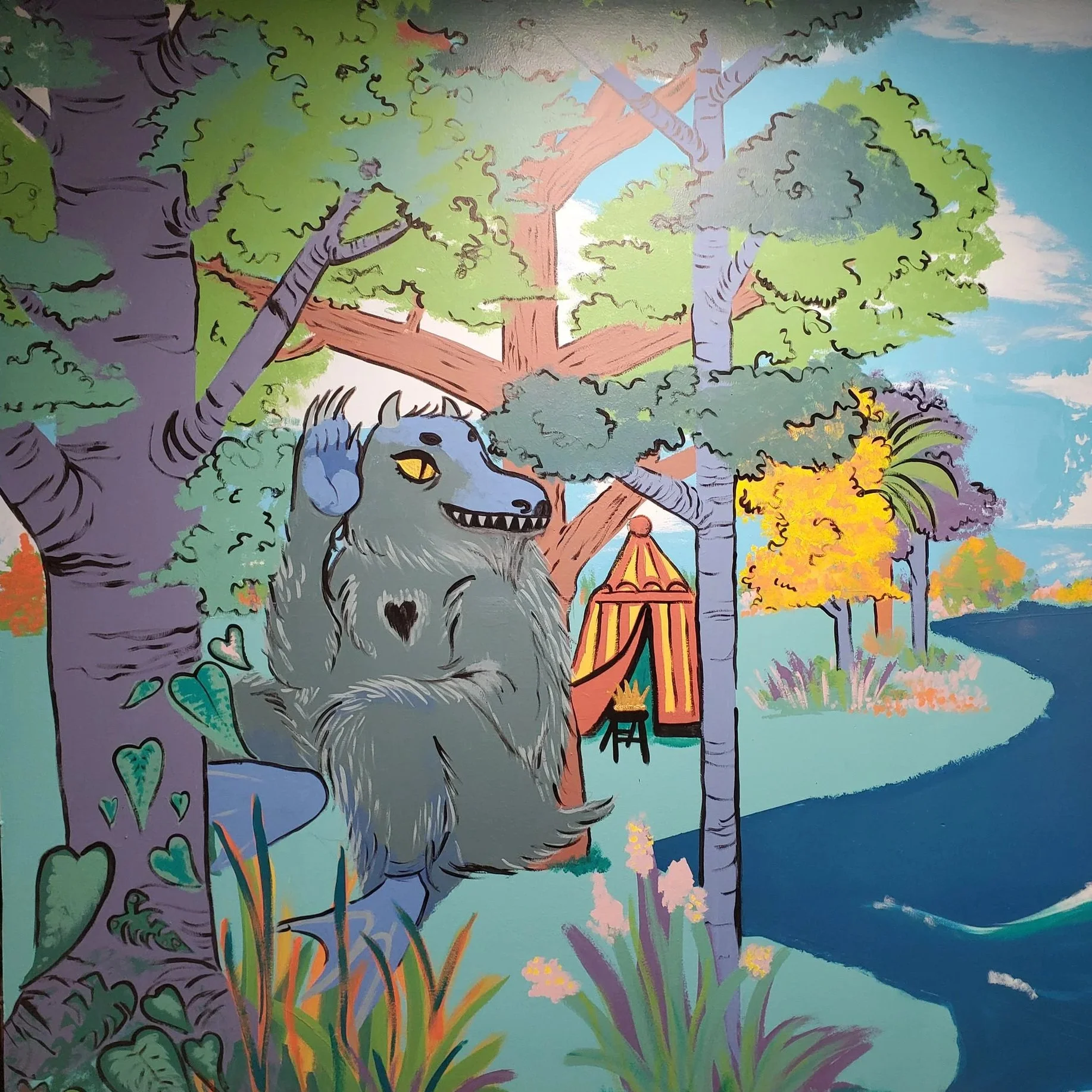 Colorful illustration of a lush, green forest scene with a large tree, a friendly-looking, gray, dog-like creature with yellow eyes sitting among plants, and a blue sky with white clouds in the background.