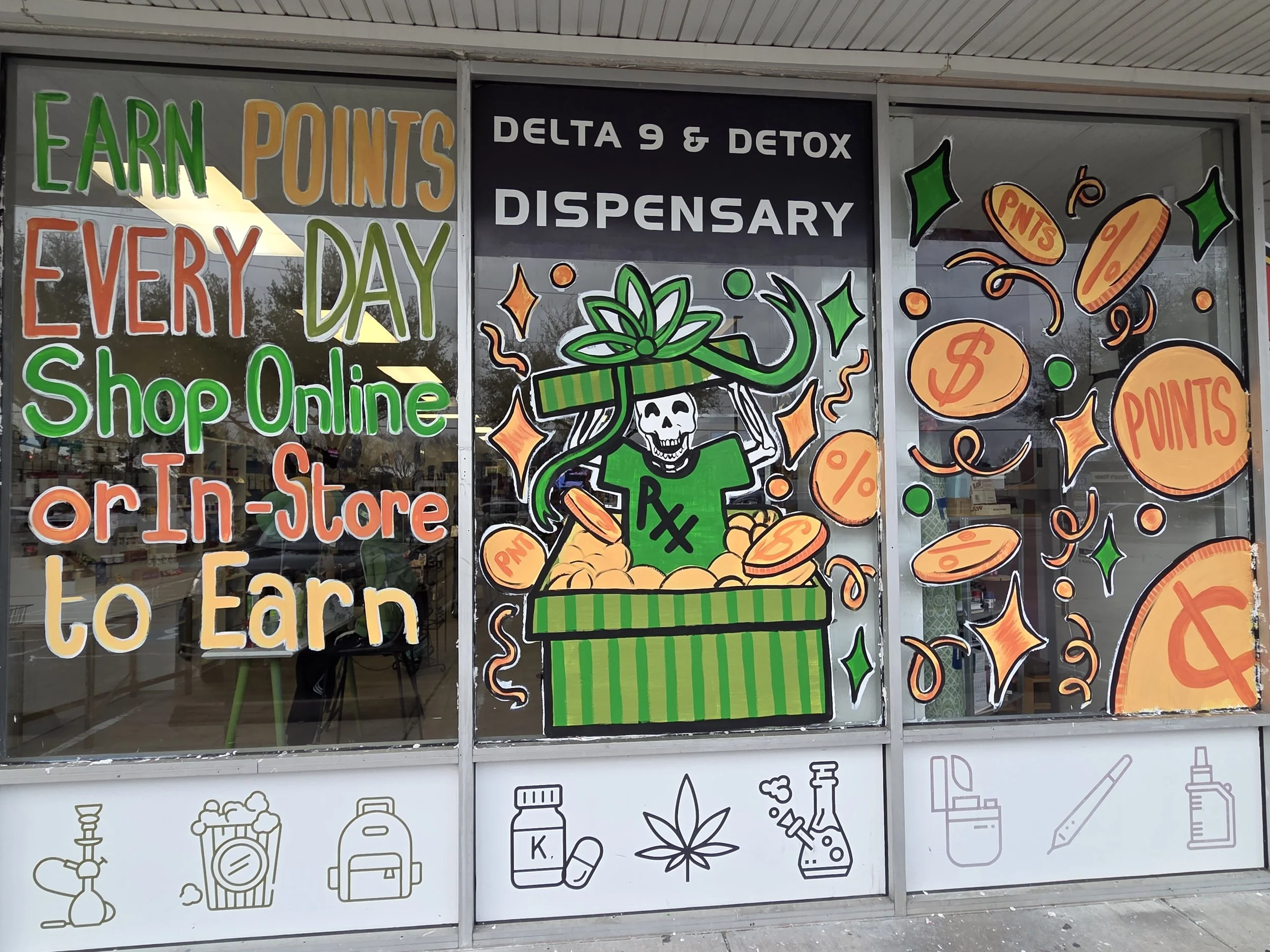 Store window display advertising earning points every day for shopping online or in-store. The display has colorful text, a cartoon skeleton with a green present on its head, and floating coins with the word 'points' and a percentage symbol.