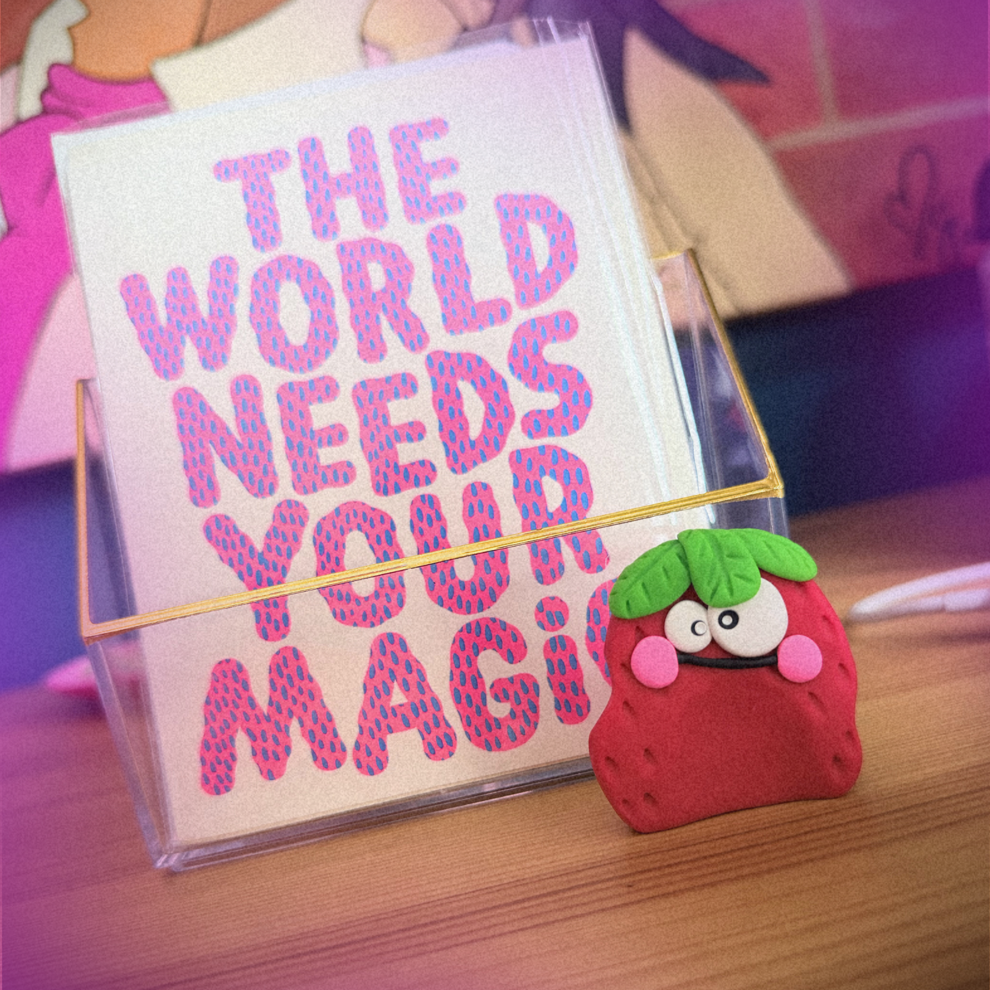 Strawbert Blobert standing on desk.