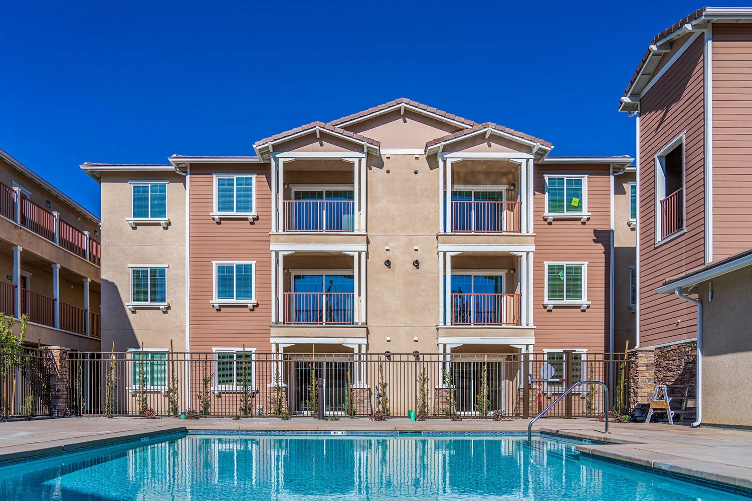 Charming Turtle Creek Exterior with resort-style swimming pool in interior courtyard for optimal relaxation