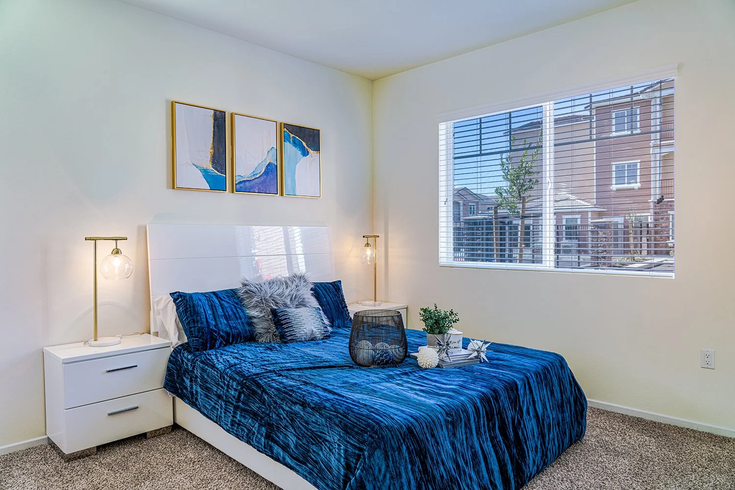 Second bedroom in Turtle Creek Apartment home with plush carpet for ultimate comfort and large windows with lovely views, allowing for gorgeous natural light to filter through the space. 