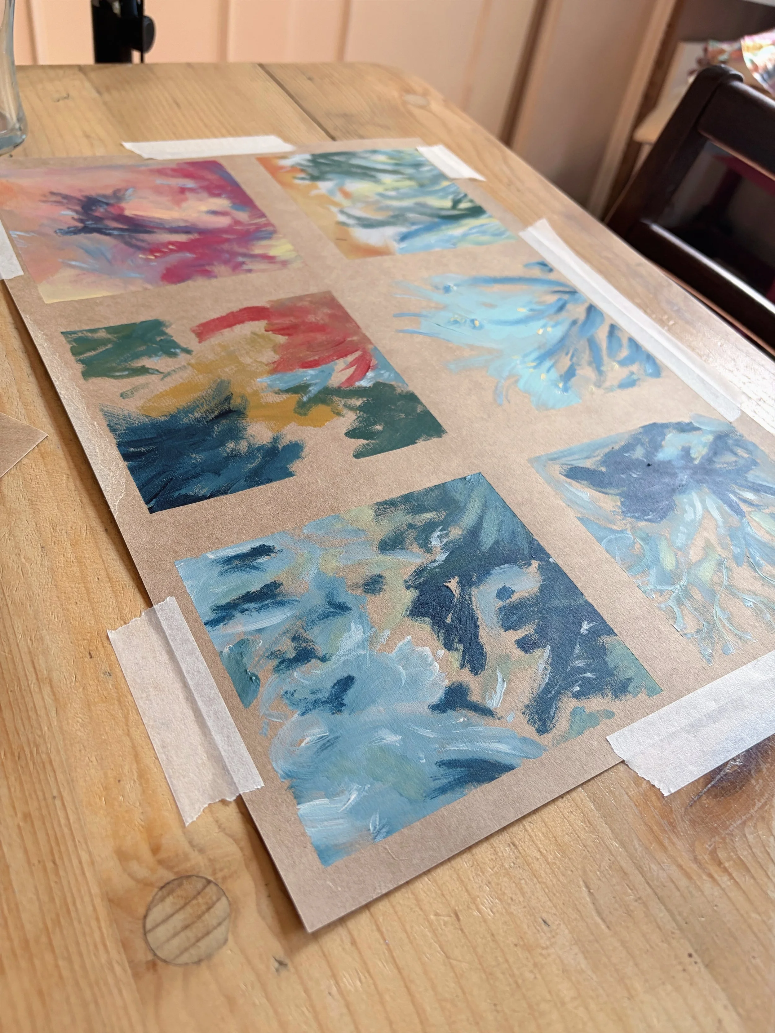 A photograph of 6 acrylic abstract paintings in blue, pinks, yellows and greens, by a London artist