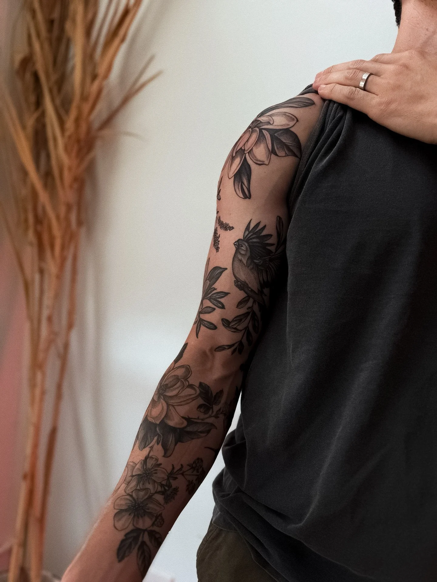 blackwork botanical patchwork sleeve featuring texas native flora and fauna