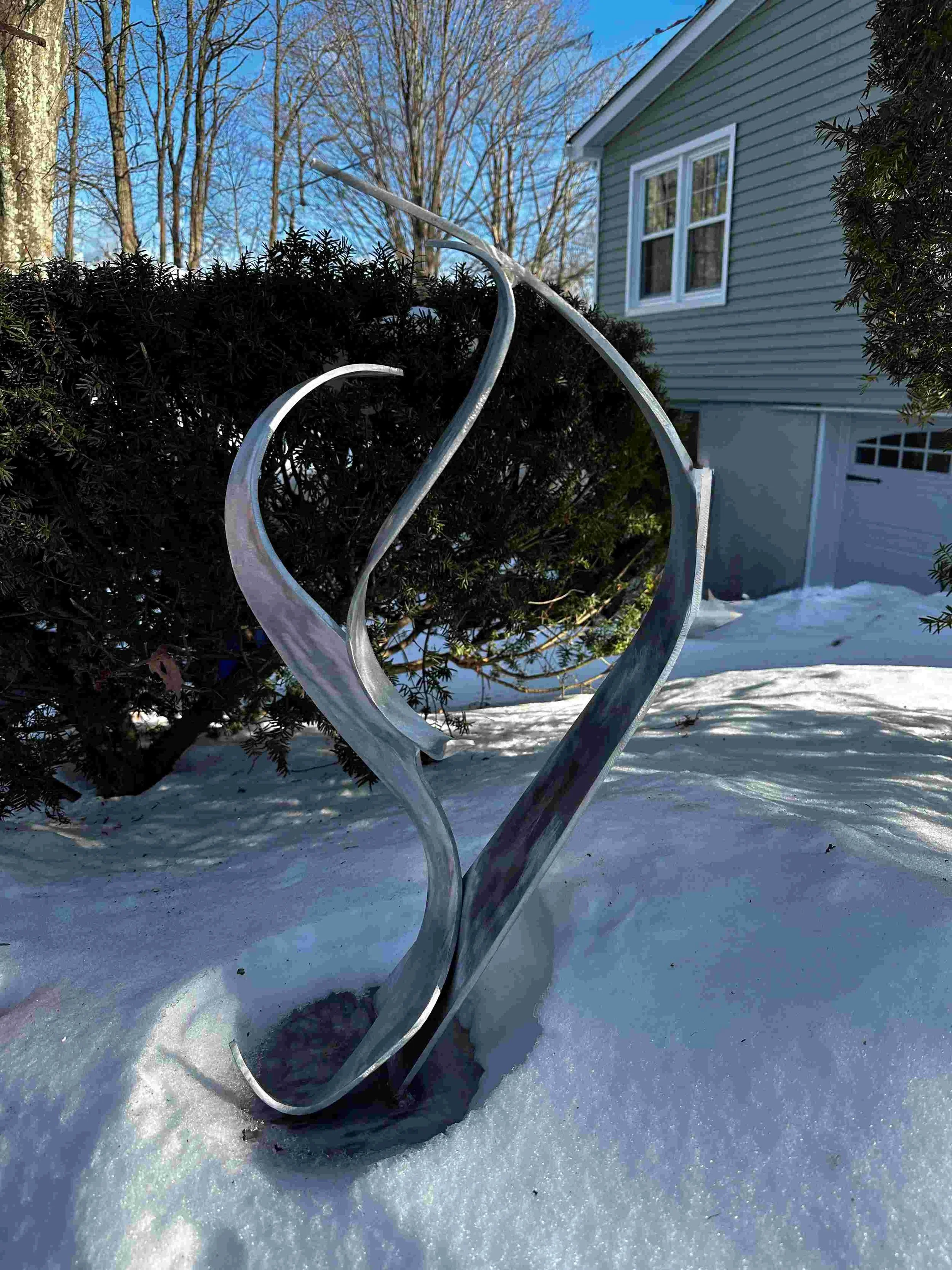 jodi-carlson-welded-aluminum-sculpture-where-love-bends-snow1-lowres.jpg