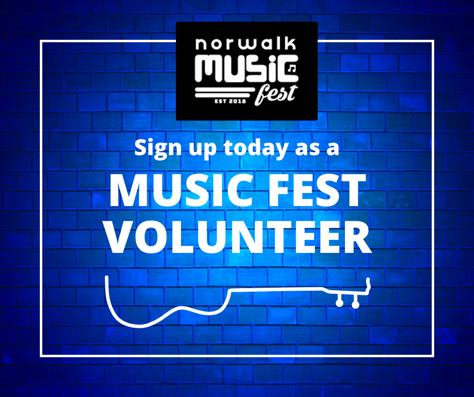 Blue brick wall with a black and white sign at the top that reads 'Norwalk Music Fest EST 2018'. In the center, large white text says 'Sign up today as a MUSIC FEST VOLUNTEER', with a white outline of a guitar at the bottom.