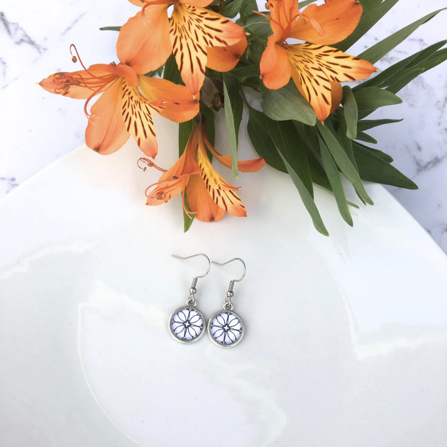 Handmade flower stainless dangle earrings.png