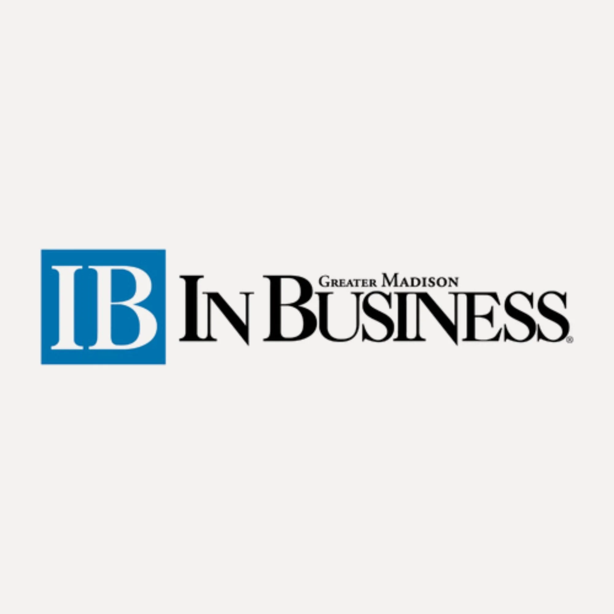 Greater Madison IB Business logo with blue IB shield and text in black.