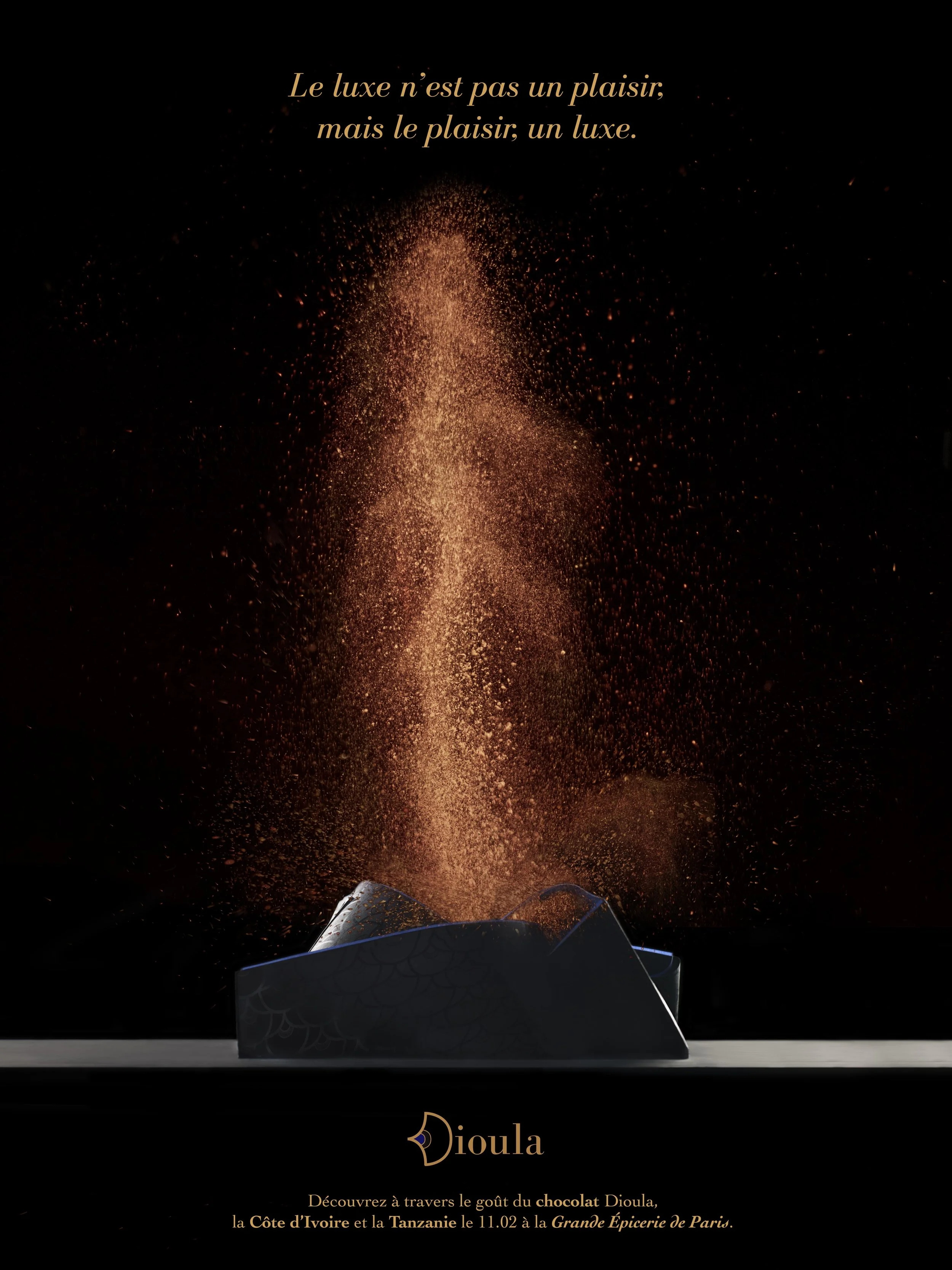 A black background with a lava-like explosion and sparks, French text about luxury and chocolate, and the word 'Dioula' at the bottom, with an invitation to discover its taste in Paris.
