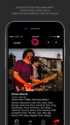 A smartphone screen displaying a music app with a photo of a band performing outdoors, featuring a guitarist with curly hair wearing a red shirt, and music genre details listed below.