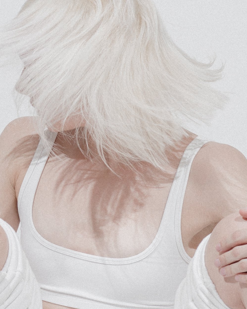 Close-up of woman shaking her hair