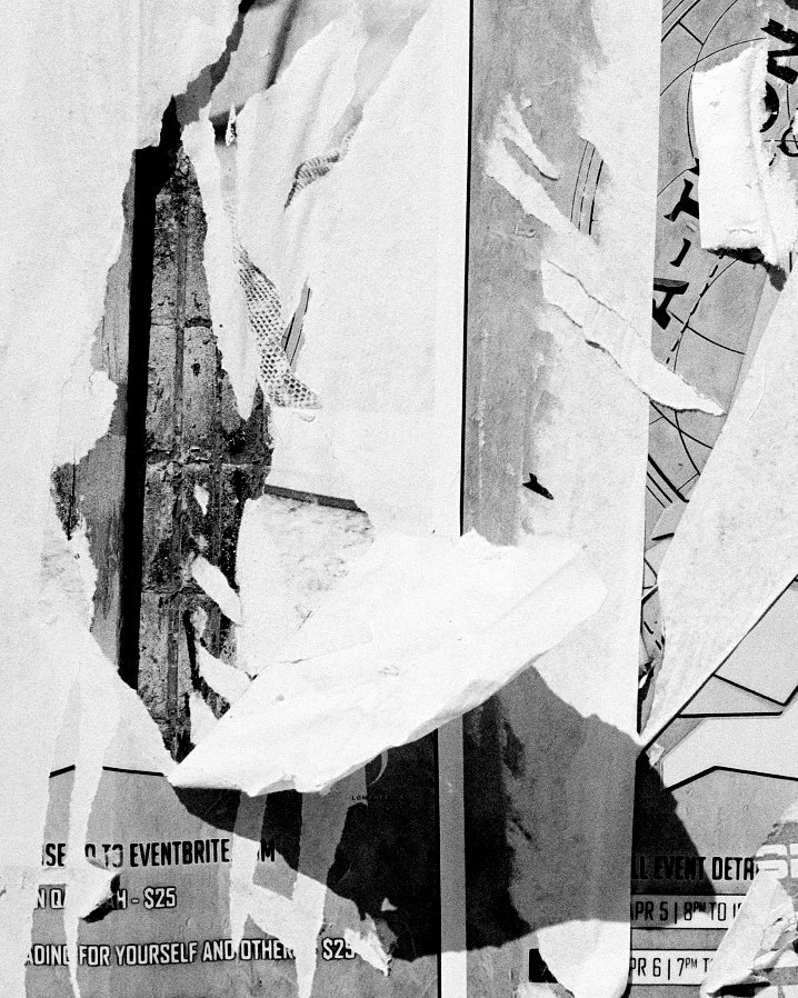 Abstract close-up of a ripping paper on a wall