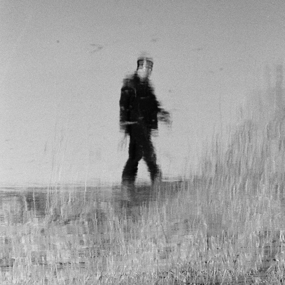 Reflection of a man on the water