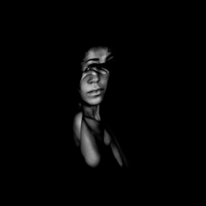 A portrait of a nude woman being distorted