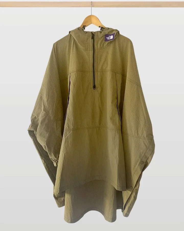 Just blown in, a North Face Purple Label Ripstop Poncho. A simple style statement with great functionality worn by Gauchos, Clint Eastwood and the odd serial killer in pouring rain on the side of the road. Generously sized to go over multiple layers,
