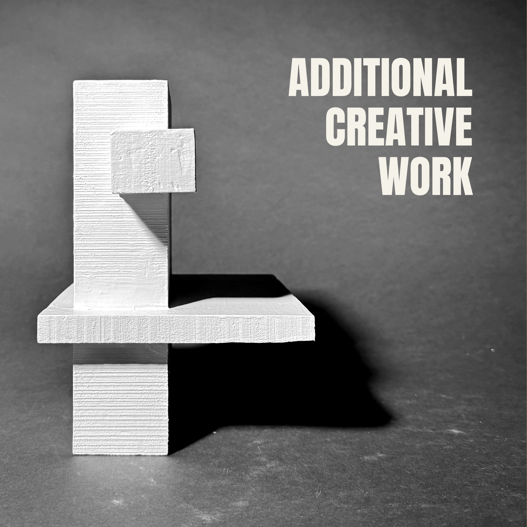 Black and white close-up of wooden blocks stacked in a step pattern with the text 'ADDITIONAL CREATIVE WORK' next to them.