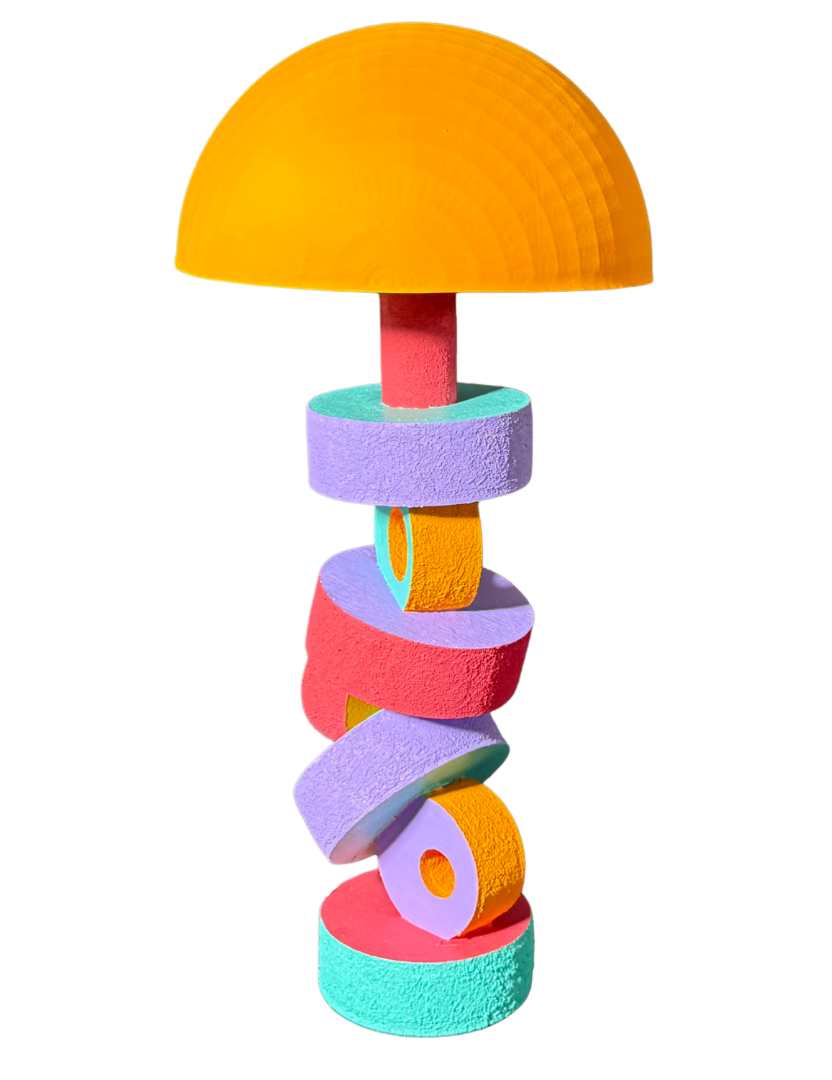 Colorful abstract sculpture resembling stacked geometric shapes and a mushroom cap with a black background.