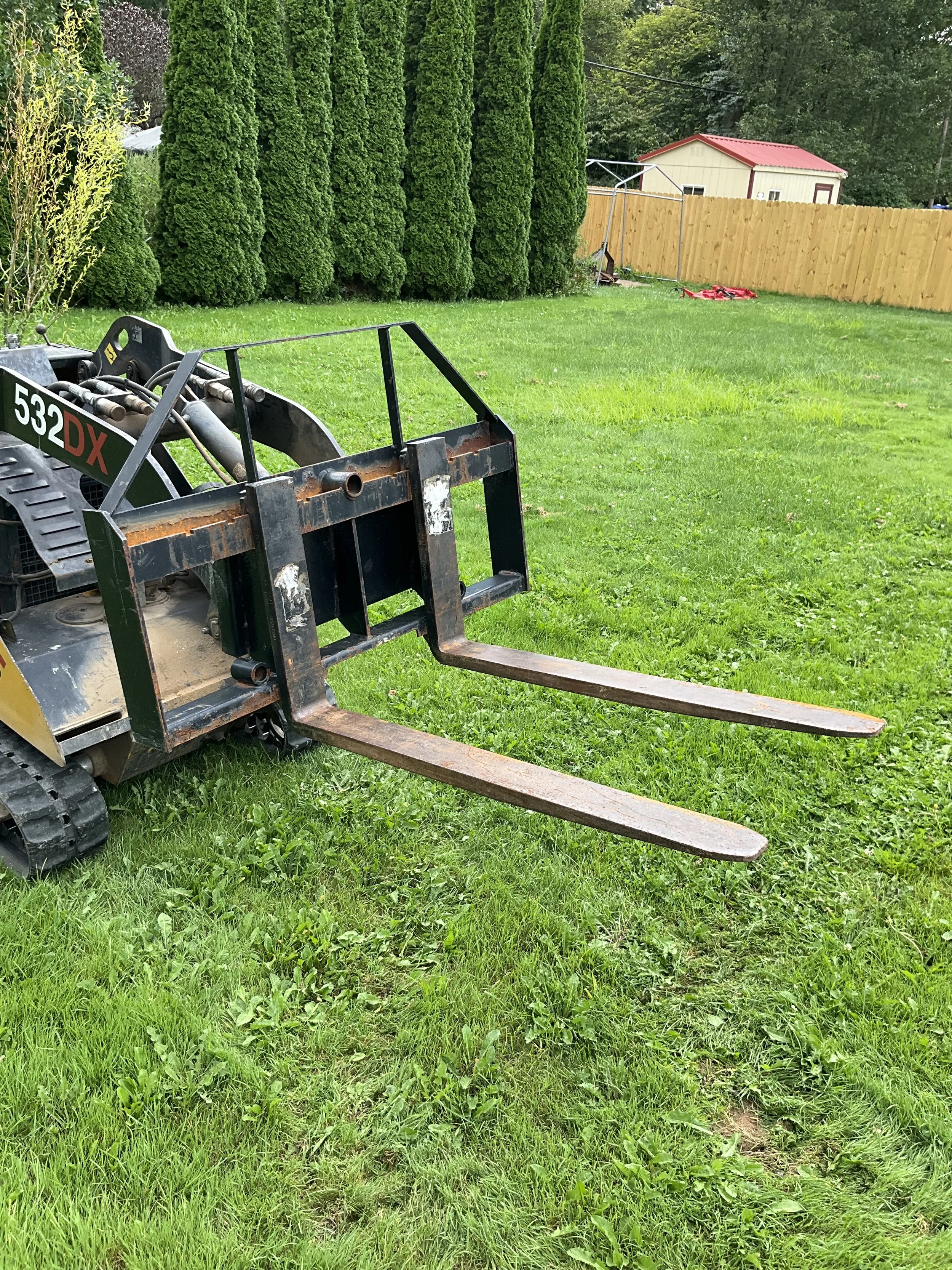 Mini skid steer pallet forks