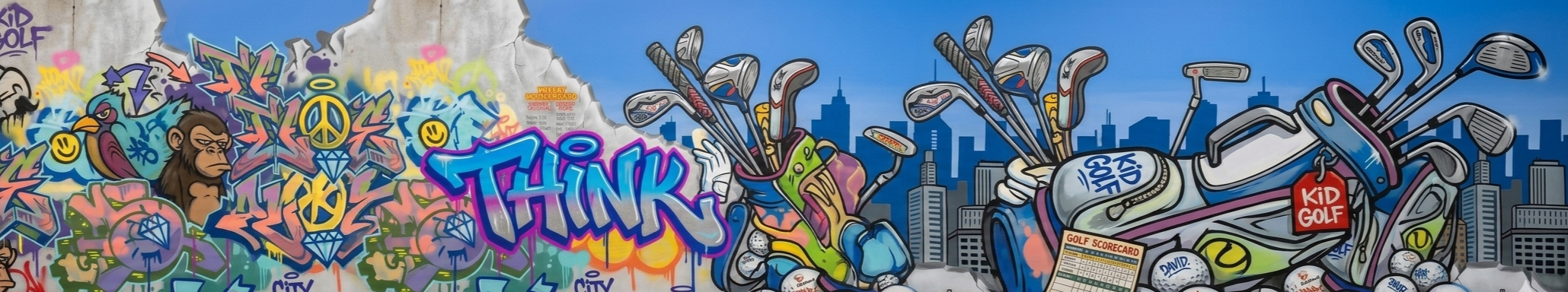 Colorful graffiti mural featuring a geared-up golf bag with golf clubs, a cartoonish golf ball with a face, and a city skyline in the background.