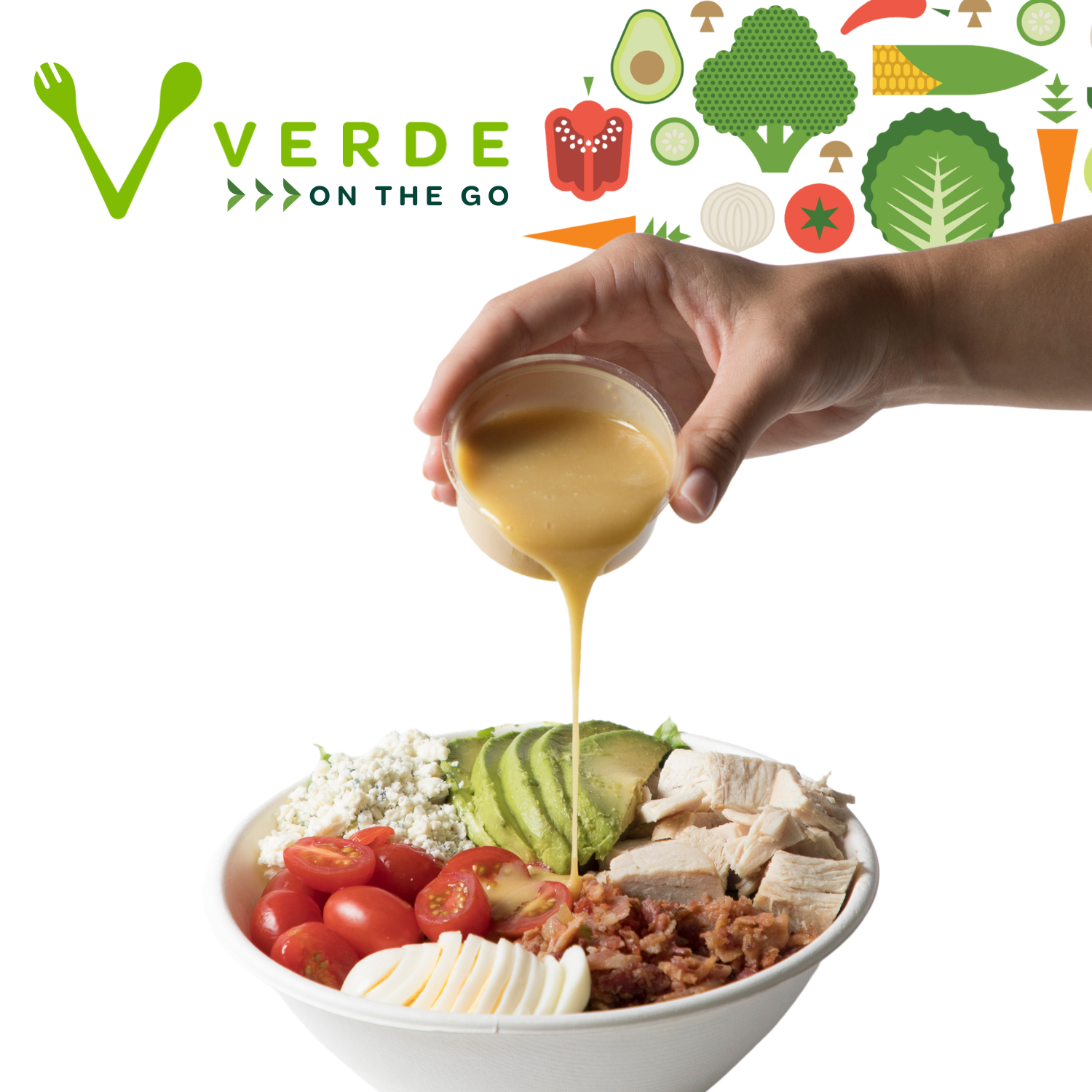 A person drizzling sauce over a vibrant bowl of fresh salads, showcasing Verde's commitment to healthy dining in Charleston, SC.
